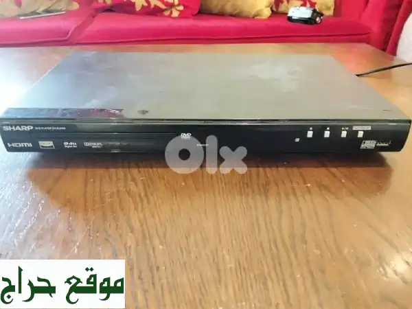 مشغل دي في دي شارب DV-SL2400W بحالة ممتازة - تقريباً جديد!