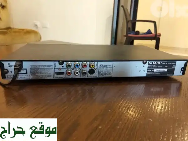 مشغل دي في دي شارب DV-SL2400W بحالة ممتازة - تقريباً جديد!