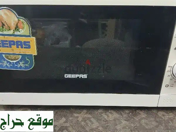فرن مايكرويف جيباس 23 لتر - نظيف ويعمل بكفاءة - 12...