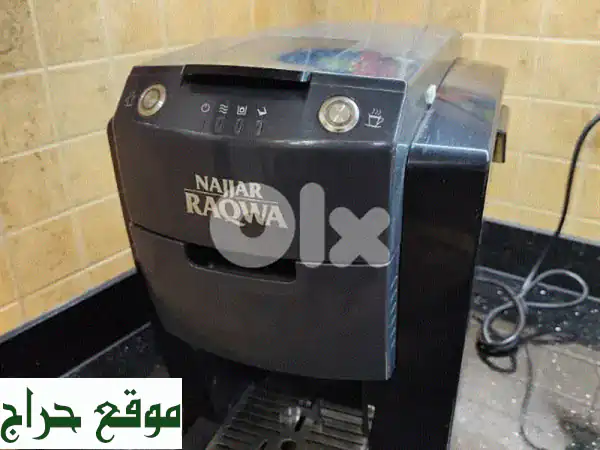 قهوة بنكهة الذكريات: ماكينة قهوة ركوة نجار شبه...