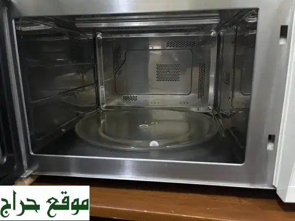 فرن ميكروويف LG Convection 32 لتر - بحالة ممتازة | ارفع...