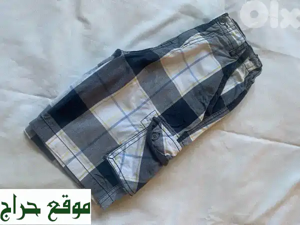 تيشيرت اولادي أمريكي أصلي - بحالة ممتازة - مقاس 7 سنوات
