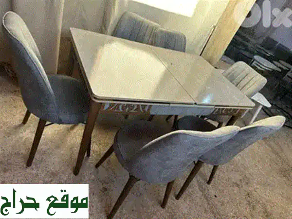 فرصة نادرة: طاولة طعام أوروبية فاخرة قابلة للتمديد (شبه جديدة)