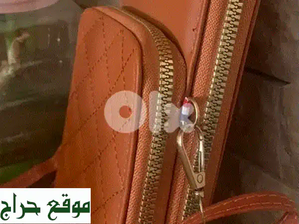 شنطة كروس أصلية فاخرة - لون جملي مميز | بحالة...