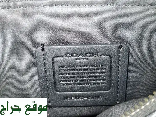 فرصة مميزة: حقيبة كروسبودي كوتش جلد أصلي | أسود - بحالة ممتازة للبيع