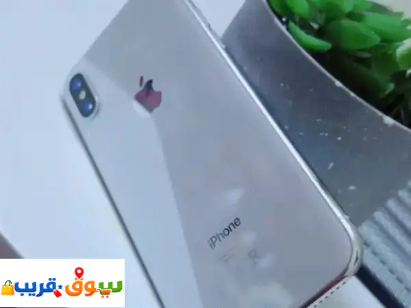للبيع: آيفون X أبيض 64 جيجابايت | صحة بطارية 86% |...