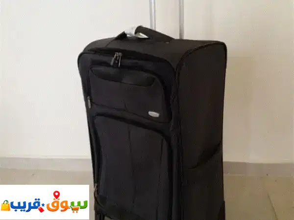 ✨ حقيبة سفر Skyline الكبيرة الدوارة (Softside) |...
