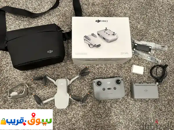 DJI Mini 2 Fly More Combo Quadcopter w Remote Controller