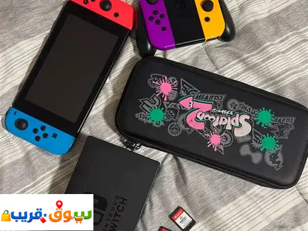 Nintendo Switch with 4 controllers, case, docking station and 2 games