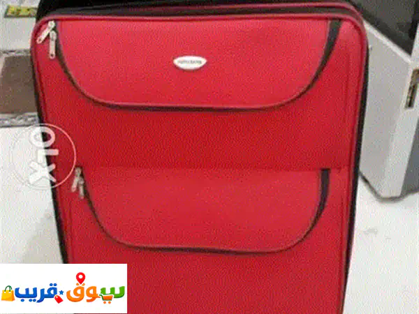للبيع: شنطة سفر كبيرة متينة بدواليب | فيبر وقماش |...