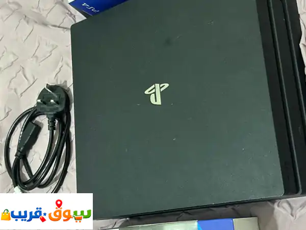 بلايستيشن 4 برو (PS4 Pro) كالجديد 🎮 مع 4 ألعاب و2 يد...
