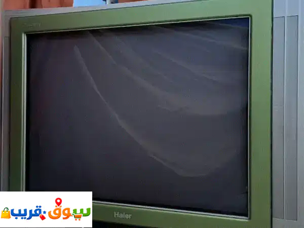 تلفزيون هاير فينتاج فضي + طاولة متكاملة: لمسة...