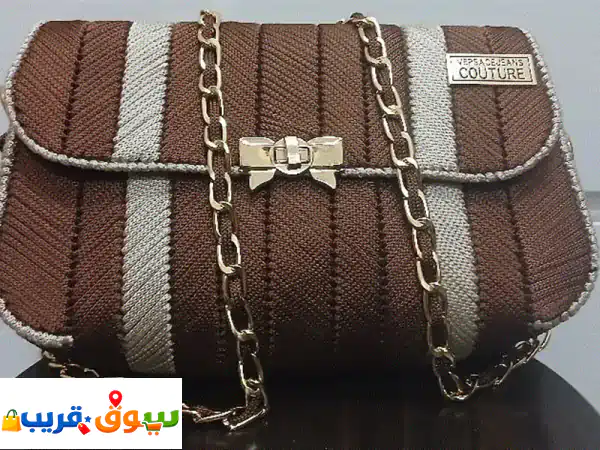 شنطة يدوية مصنوعة من شبك الكانفا بتصميم أنيق...