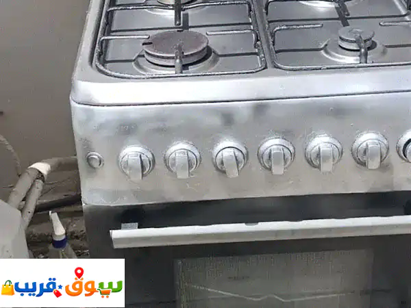 فرصة لا تفوت: فرن بوتاجاز 4 شعلات بحالة ممتازة للبيع | جاهز لابتكاراتك في المطبخ!