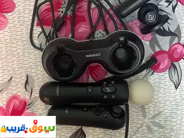 للبيع: كاميرا بلايستيشن Sony و2 يد تحكم Move + قاعدة شحن...