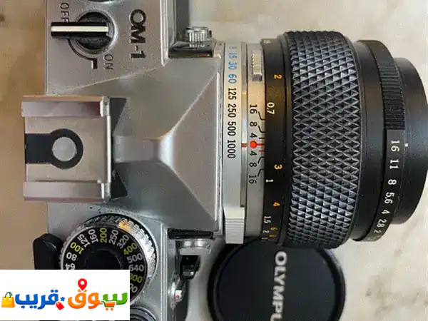 الفرصة الذهبية: كاميرا Olympus OM-1 الأسطورية مع عدسة Zuiko...