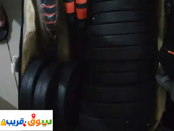 2 دمبل وبار للبيع 30 كيلو أوزان مختلفه زي الجديد...