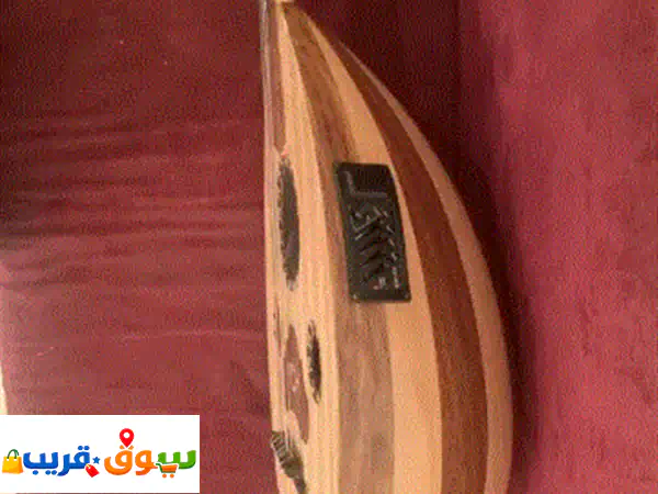 عود شبه جديد كهربائي عبارة عن آلة وتريه به...